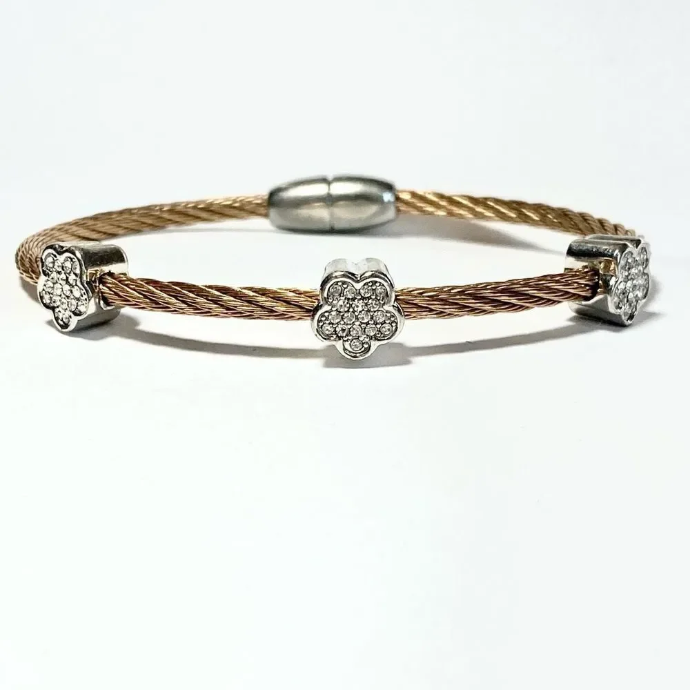 Rose gold coil cable cuff bracelet with silver frowers
